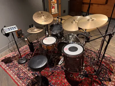 The drum kit from above. 1960s Rogers with Zildjian cymbals. Behringer P16-M personal mixer.
